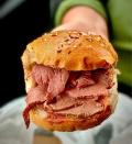 <p>A roast beef <a href="https://www.thedailymeal.com/cook/12-super-sandwiches-fit-any-meal-slideshow?referrer=yahoo&category=beauty_food&include_utm=1&utm_medium=referral&utm_source=yahoo&utm_campaign=feed" rel="nofollow noopener" target="_blank" data-ylk="slk:sandwich that’s worthy of the dinner table;elm:context_link;itc:0;sec:content-canvas" class="link ">sandwich that’s worthy of the dinner table</a>, beef on weck is a hallmark sandwich of the Buffalo, New York area. It starts with rare, thinly sliced roast beef tucked into a roll called a kummelweck, which has been dusted with coarse salt and caraway seeds. The top bun gets a dip in beef juice and the only condiment is a hefty spoonful of horseradish. It's an under-the-radar sandwich that should get a lot more attention than it does.</p>