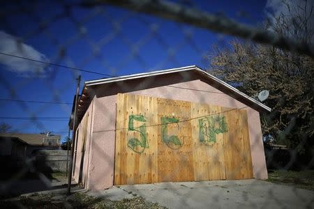 A boarded up building is seen in San Bernardino, California January 23, 2015. REUTERS/Lucy Nicholson