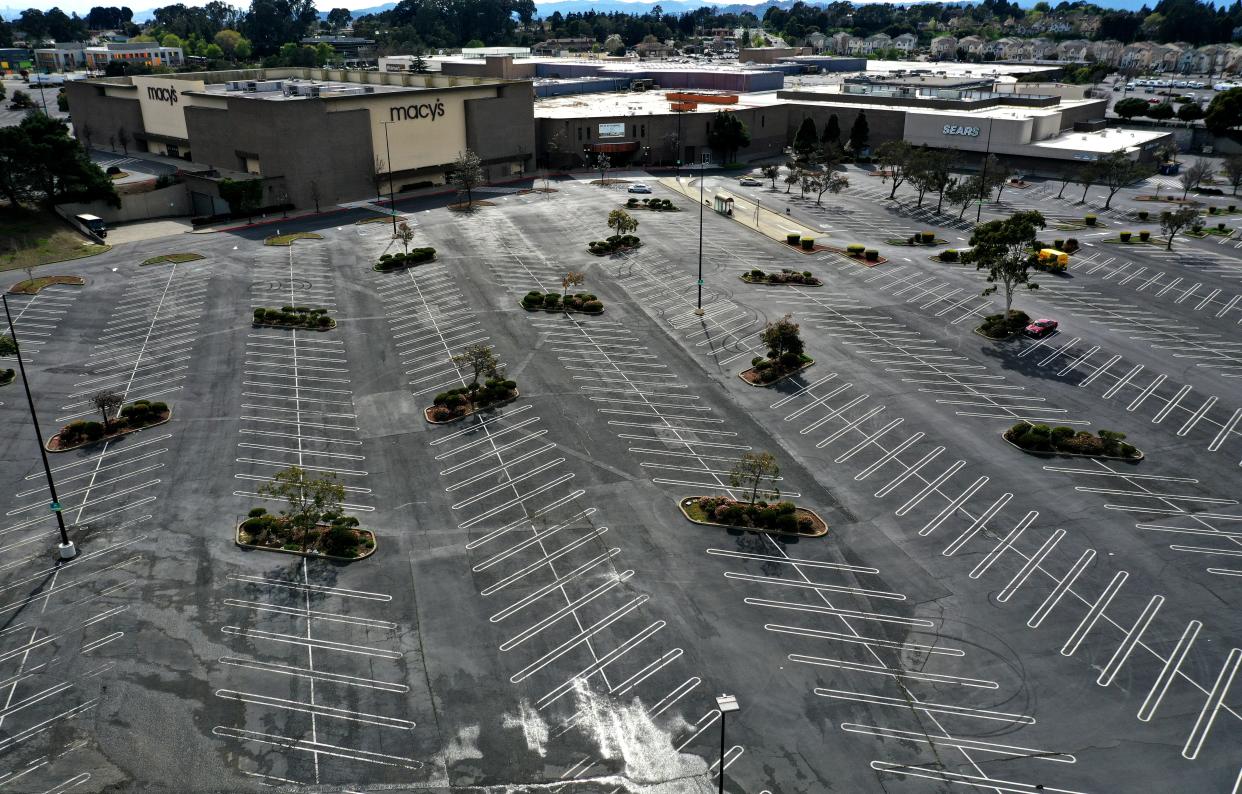 The parking lot at Hilltop Mall sits empty on March 17, 2020 in Richmond, California. Seven San Francisco Bay Area counties have ordered residents to shelter in place in an effort to reduce social interaction and slow the spread of COVID-19.