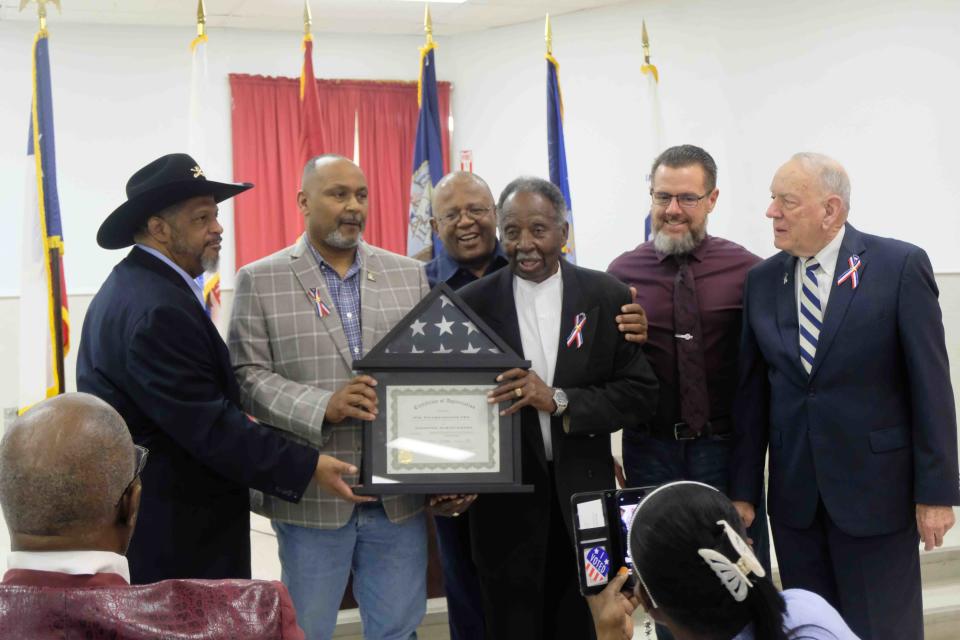 World War II Veteran Edward Owens is presented an award for his military service Nov. 12 during a ceremony at the United Citizen's Forum in North Amarillo.