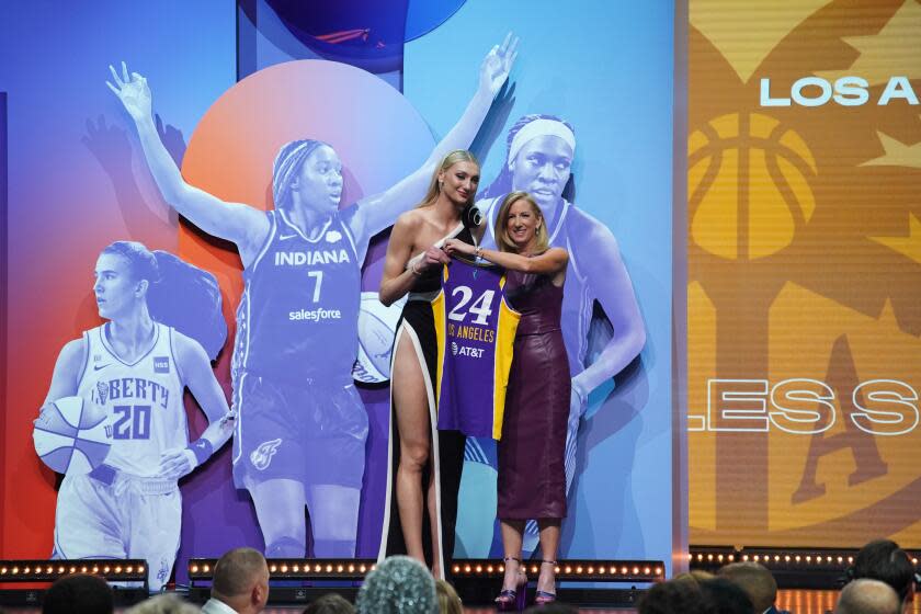 Cameron Brink poses for a photo after being drafted by the Sparks during the 2024 WNBA draft.