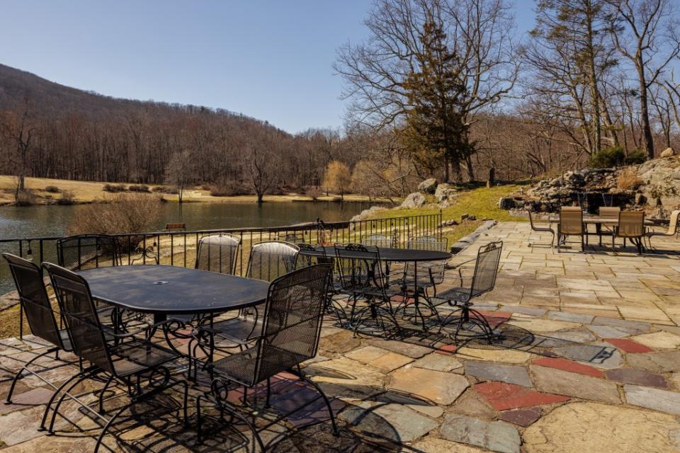 A slate patio built on the remains of the burned-down lodge. Alon Koppel Photography