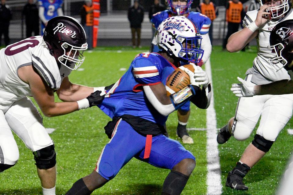 West Holmes' Sam Williams-Dixon gets a few yards against Rocky River during another huge day for the sophomore.