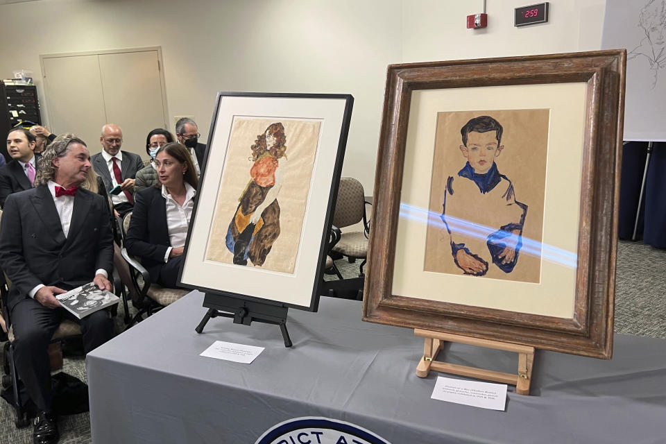 Works of art by Austrian expressionist artist Egon Schiele are on display at the Manhattan District Attorney's Office, Wednesday, Sept. 20, 2023, during a ceremony returning the pieces to the heirs of Fritz Grünbaum, a well-known cabaret performer who was arrested in 1938 and later died in the Dachau concentration camp. (AP Photo/Bobby Caina Calvan)