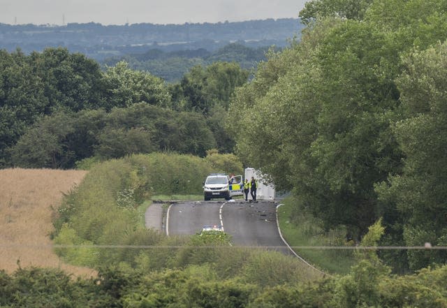 The scene on the A61 in Wakefield following a collision between a car and a motorcycle which left six people dead 