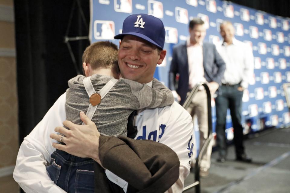 Rich Hill and his son Brice after Monday's press conference. (AP)