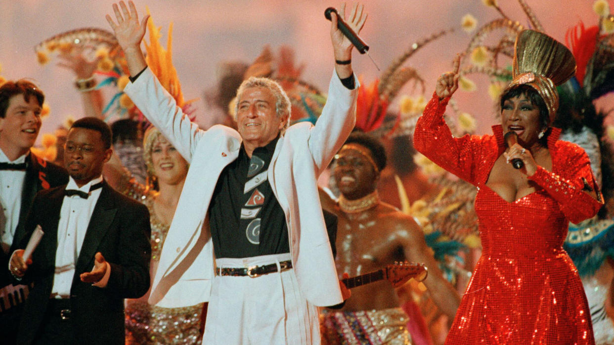 Mandatory Credit: Photo by Hans Deryk/AP/REX/Shutterstock (6528642a)Bennett LaBelle Benedetto Singers Tony Bennett and Patti LaBelle entertain the crowd during halftime at Super Bowl XXIX, at Miami's Joe Robbie StadiumSuper Bowl XXIX Half Time Show 1995, Miami, USA.