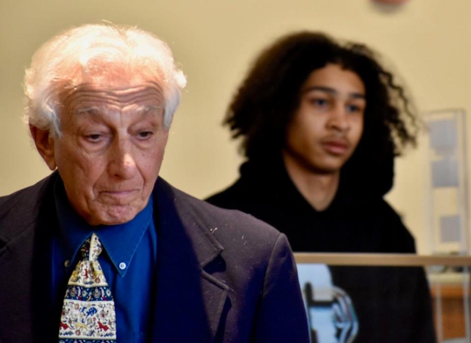 Amannie Chiclana, 19, of Fall River, at right, was arraigned in Fall River District Court Friday, March 22 on charges of murder and carrying an illegal firearm in the fatal shooting of Colus Jamal Mills-Good on Rock Street in Fall River on March 14, 2024. He is seen with his defense attorney, Louis Badwey, at left.