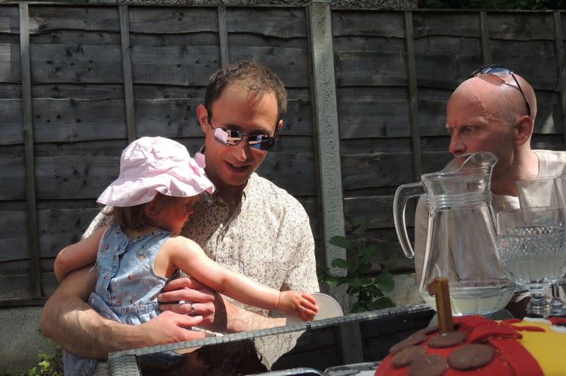 Amos and his daughter, left, with Dan -Credit:Family handout