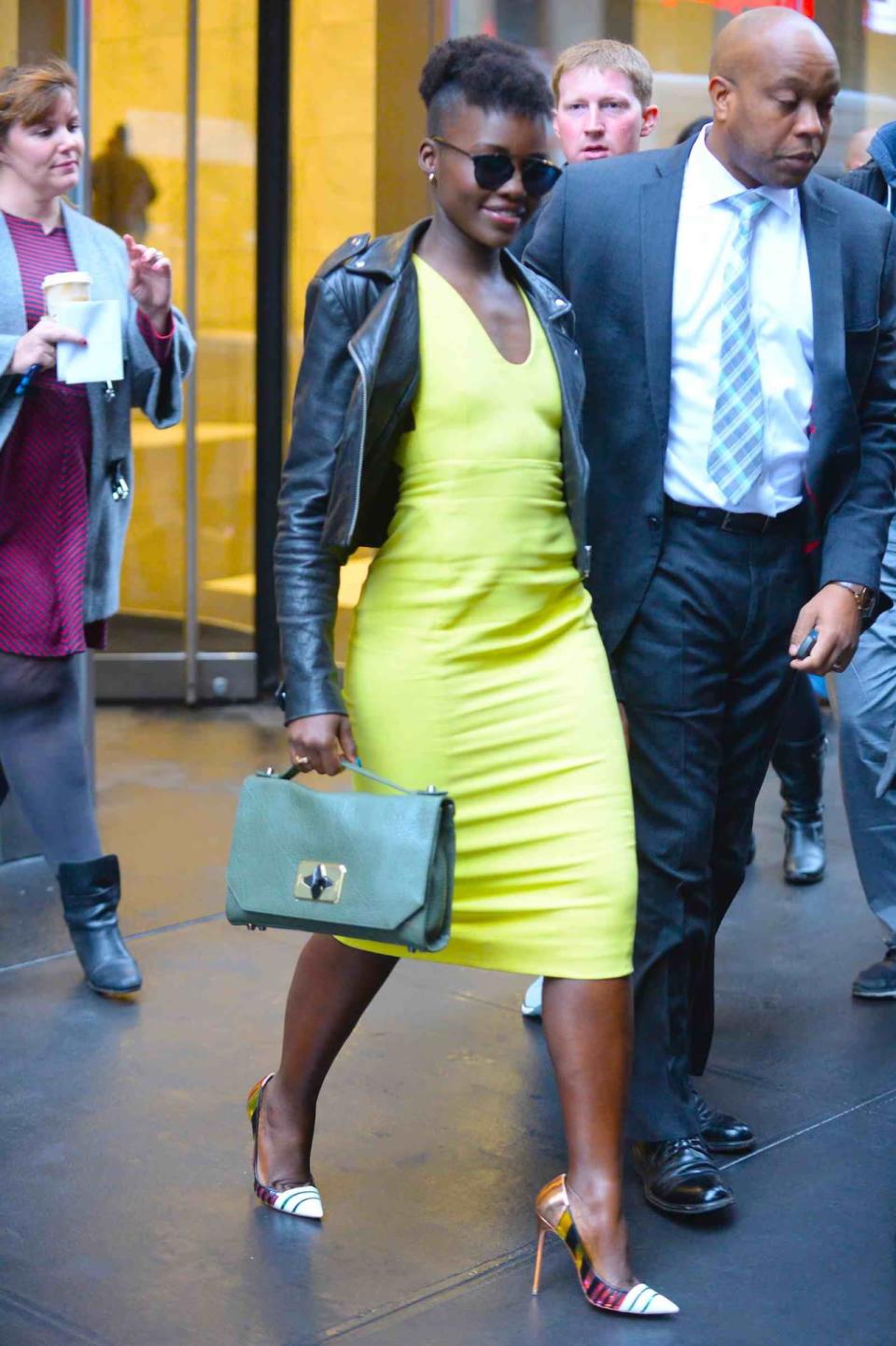 Resolution Four: Seriously consider investment pieces, a la Lupita Nyong'o. We’ll never be as elegantly cool as Lupita Nyong'o, but we can steal one of her style tricks immediately: Mixing well-made basics with trendier items. When she topped a yellow silk dress with a black biker jacket last month in New York, threw a Rick Owens leather hoodie over airport pants in LA, and left her Broadway stage door in a deep green peacoat, she proved a few key pieces can pull a look together easily, effortlessly, and in a lasting (read: no more yearly coat shopping) way. Gracias, Lupita!
