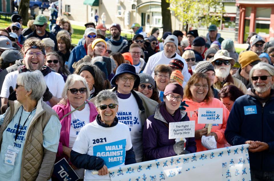 Participants gather on Sunday, Oct. 22, 2023 in Petoskey's Pennsylvania Park prior to the Walk Against Hate.