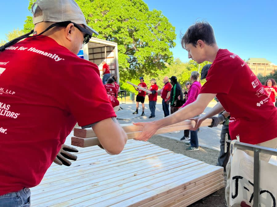 Multiple volunteers came together on Thursday for Habitat for Humanity Texas’ Day at the Dome Capitol Build to help build a home for a Texas family in need | Todd Bailey/KXAN News