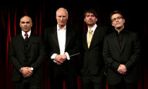 The four male contestants (minus David Soul, who did not attend) (from left to right) Goldie, Peter Snow, Alex James and Bradley Walsh during a photocall to launch BBC Two's 'Maestro' - where eight celebrity amateurs will compete for the chance to conduct the BBC Concert Orchestra in front of a live audience of 30,000 at Proms in the Park - at the Criterion Theatre in central London. (Photo by Yui Mok - PA Images/PA Images via Getty Images)