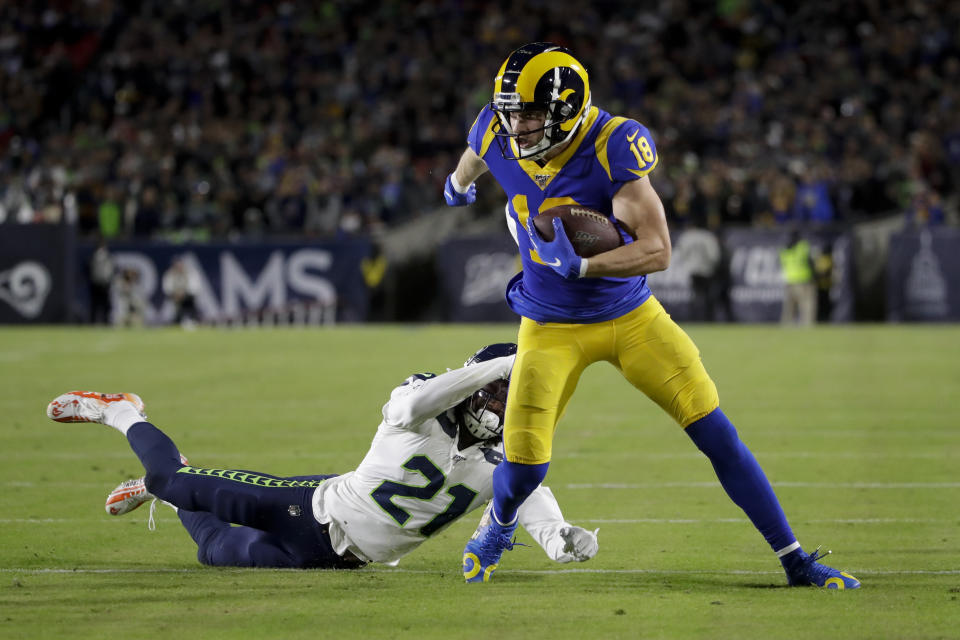 Los Angeles Rams wide receiver Cooper Kupp breaks away form Seattle Seahawks cornerback Tre Flowers during the first half of an NFL football game Sunday, Dec. 8, 2019, in Los Angeles. (AP Photo/Marcio Jose Sanchez)