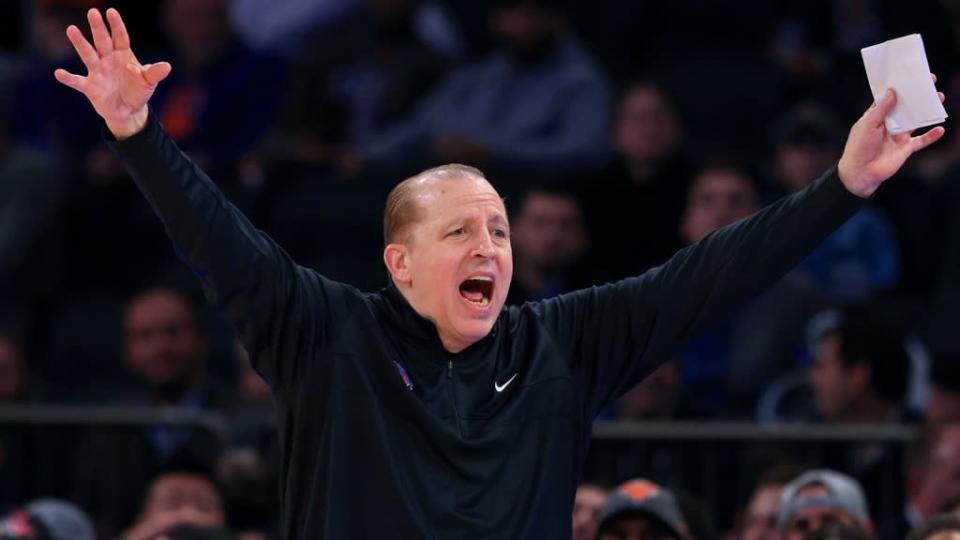 Tom Thibodeau yelling hands up black shirt