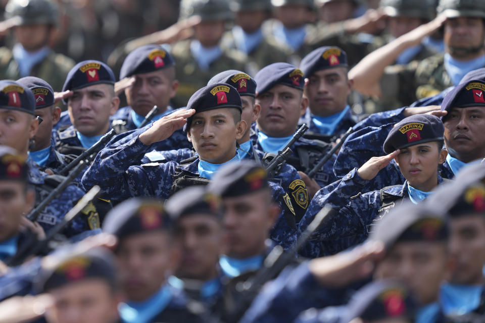 Army soldiers salute President Bernardo Arévalo to acknowledged him as their commander and chief at Constitution square in Guatemala City, Monday, Jan. 15, 2024, the morning after his inauguration. (AP Photo/Moises Castillo)