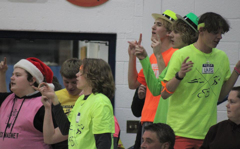 Mackinaw City's student section supporters were very much in the Christmas spirit, singing several songs throughout Tuesday's girls basketball contest against Ellsworth.