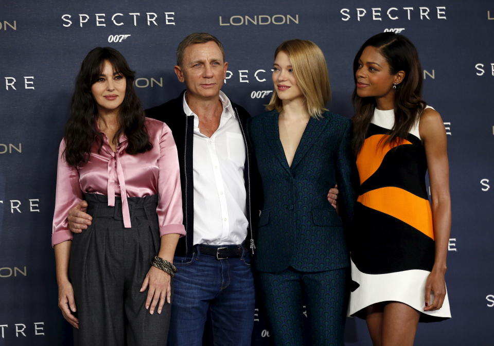 Actors Monica Bellucci, Daniel Craig, Lea Seydoux and Naomie Harris (L-R) pose during a photocall for the new James Bond film "Spectre" in central London, Britain October 22, 2015. REUTERS/Stefan Wermuth