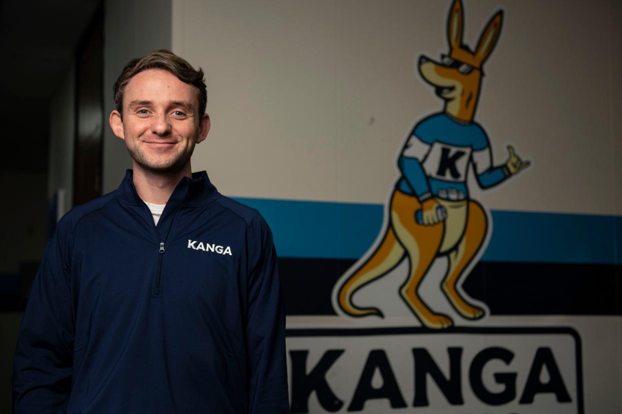 Ryan Frazier, co-founder of Kanga Coolers, poses for a portrait in the front office of the facility in Greenville on Monday, Dec. 18, 2023.
