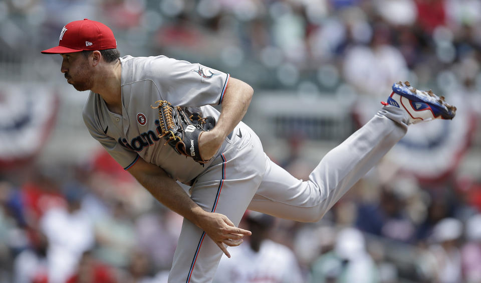 Miami Marlins pitcher Zach Thompson works against the Atlanta Braves in the first inning of a baseball game Sunday, July 4, 2021, in Atlanta. (AP Photo/Ben Margot)