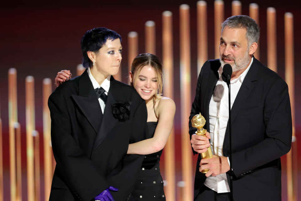 BEVERLY HILLS, CALIFORNIA - JANUARY 10: 80th Annual GOLDEN GLOBE AWARDS -- Pictured: (L-R) Emma D’Arcy, Milly Alcock, and Miguel Sapochnik accept the Best Television Series – Drama award for 