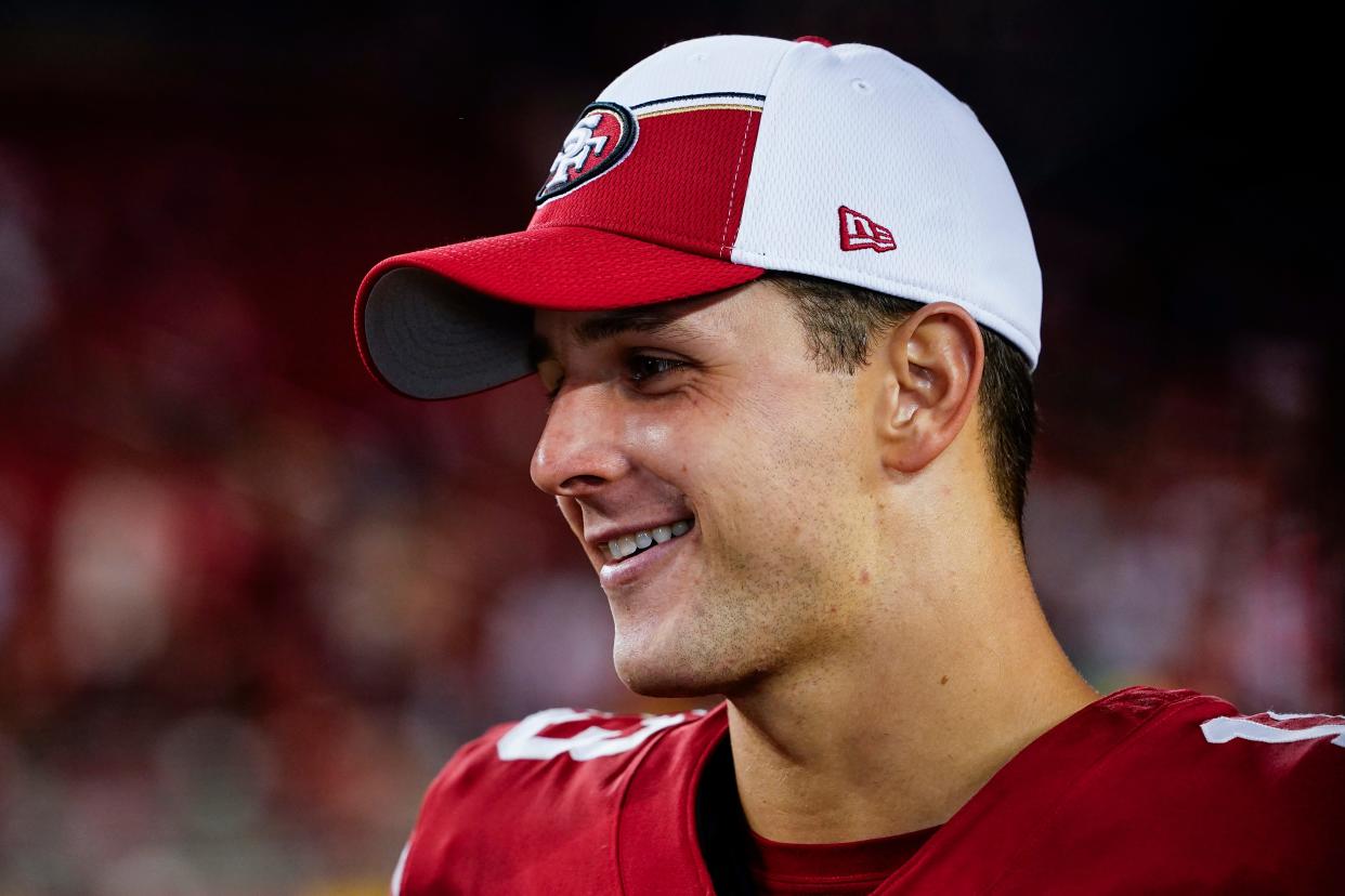 San Francisco 49ers quarterback Brock Purdy talks to a reporter after an NFL football game against the Dallas Cowboys on Sunday, Oct. 8, 2023, in Santa Clara, Calif.