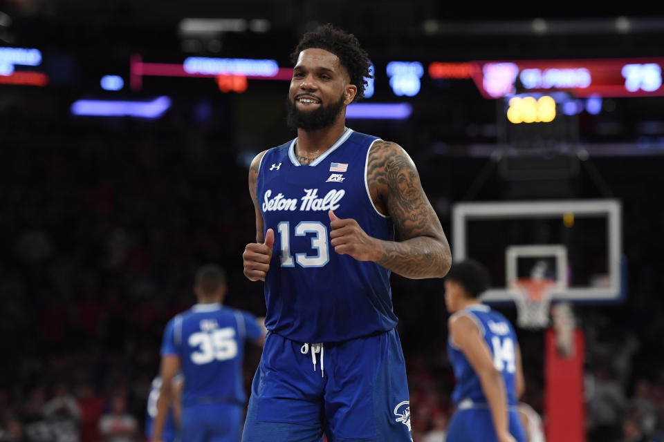 Seton Hall guard Myles Powell (13) reacts after making a basket during the second half of an NCAA college basketball game against St. John's in New York, Saturday, Jan. 18, 2020. Seton Hall won 82-79. (AP Photo/Sarah Stier)