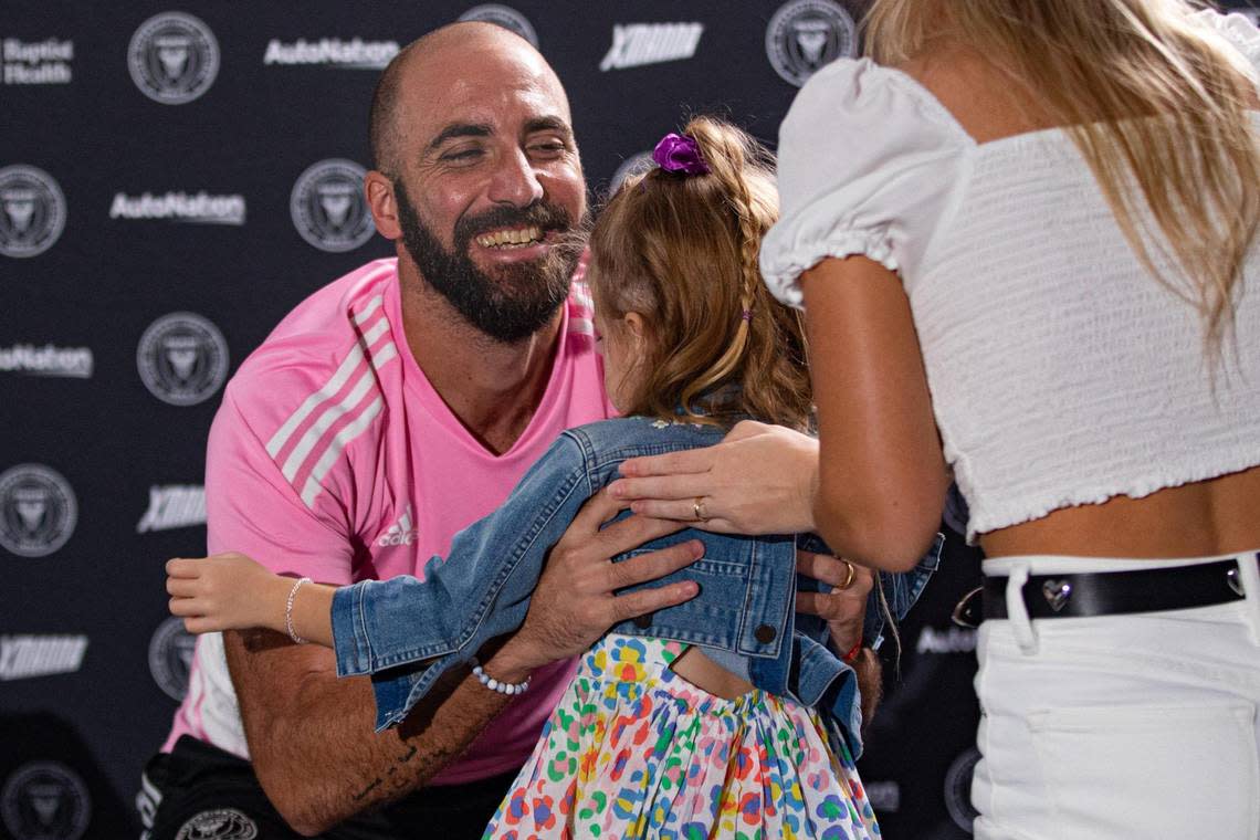 Inter Miami forward Gonzalo Higuaín (10) reacts with his family during a press conference after announcing his retirement on Monday, October 3, 2022 at DRV PNK Stadium in Fort Lauderdale, Florida.