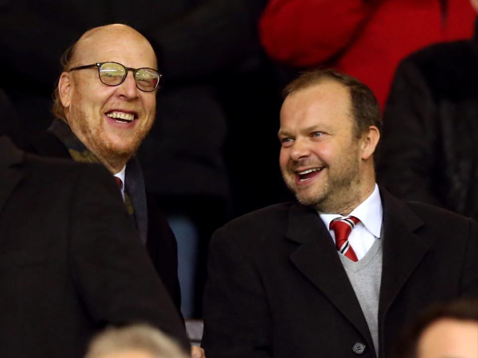 Manchester United owner Avram Glazer (left) and executive vice chairman Ed Woodward (PA)