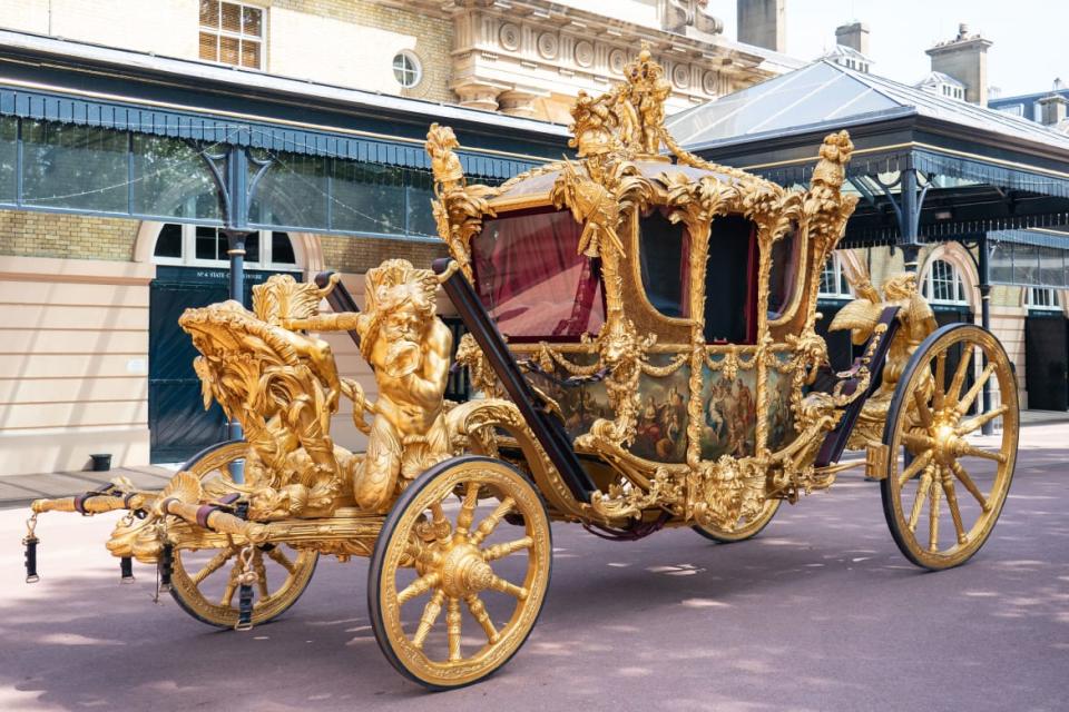 <div class="inline-image__caption"><p>The Gold State Coach at the Royal Mews, Buckingham Palace.</p></div> <div class="inline-image__credit">Dominic Lipinski/Getty Images</div>
