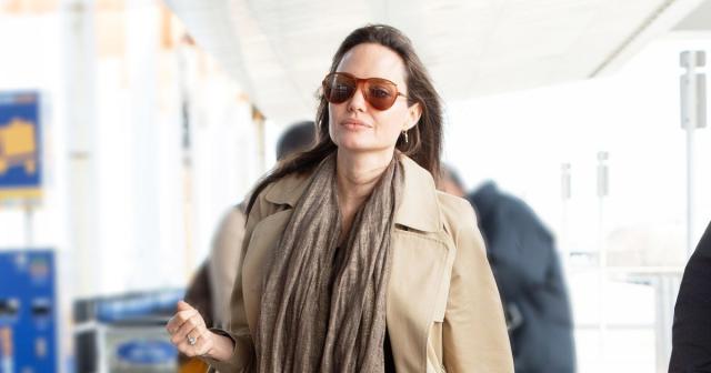 Angelina Jolie Gives A Rare Street Style Look In A White Wrap