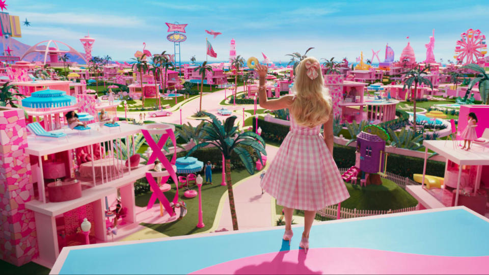 A film still including Margot Robbie as Barbie in the film Barbie