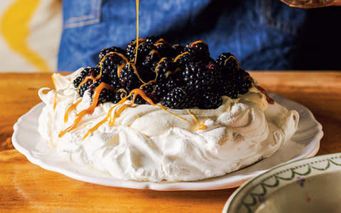 Blackberry and sage pavlova with salted-caramel sauce - Credit: Haarala Hamilton