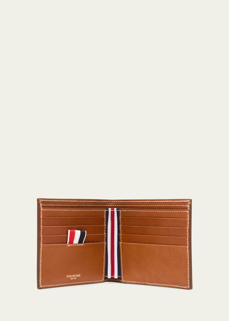 <p><a href="https://go.redirectingat.com?id=74968X1596630&url=https%3A%2F%2Fwww.bergdorfgoodman.com%2Fp%2Fthom-browne-mens-vacchetta-leather-billfold-wallet-prod181360143&sref=https%3A%2F%2Fwww.harpersbazaar.com%2Ffashion%2Ftrends%2Fg46067824%2Fbest-stocking-stuffers-for-men%2F" rel="nofollow noopener" target="_blank" data-ylk="slk:Shop Now;elm:context_link;itc:0;sec:content-canvas" class="link ">Shop Now</a></p><p>Vacchetta Leather Billfold Wallet</p><p>bergdorfgoodman.com</p><p>$490.00</p><span class="copyright">bergdorfgoodman.com</span>