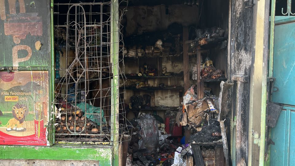 The charred remains of Phylic Kerubo’s convenience store. - Bethlehem Feleke/CNN