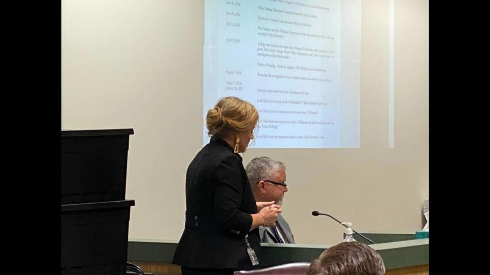 District Attorney Angel Myers McIlrath questions Jackson County sheriff’s Deputy Eddie Clark during a hearing Wednesday, April 6, 2022, in the sex crimes case against Jacob Blair Scott in Jackson County.