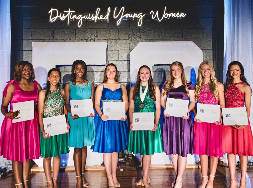 The Distinguished Young Women of Washington County gather on stage during a 50th anniversary celebration on July 15, 2023, in Chatom, Alabama. Participants, from left, include Sanaa Thomas, Kaylee Williams, Mikaya Thompson, Margret Flowers, Allie Floyd, Madyson Jackson, Brookelyn Keith and Nour Jabnouni.