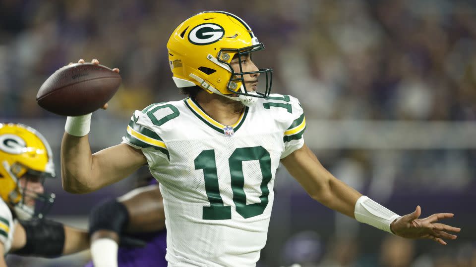 Love passes during the first quarter against the Vikings. - David Berding/Getty Images