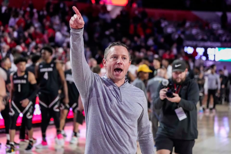 Jan 28, 2023; Athens, Georgia, USA; Georgia Bulldogs head coach Mike White reacts to the fans after Georgia defeated the South Carolina Gamecocks in overtime at Stegeman Coliseum. Mandatory Credit: Dale Zanine-USA TODAY Sports