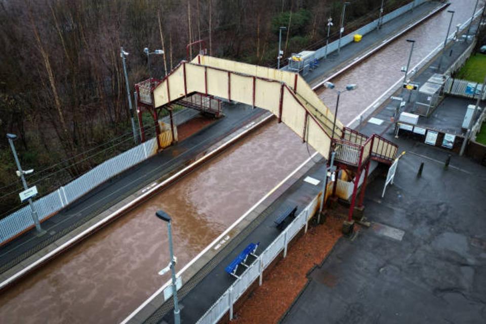 Swimming pool-esque conditions made passing along the railway line at Bowling station a challenge on Wednesday (Getty Images)