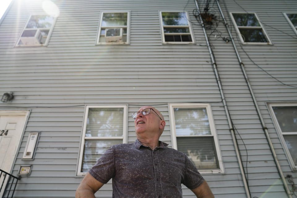 Gary Zaremba stands outside one of his rental properties, Thursday, Aug. 12, 2021, in the Queens borough of New York. Landlords say they have suffered financially due to various state, local and federal moratoriums in place since last year. “Without rent, we’re out of business," said Zaremba. (AP Photo/John Minchillo)