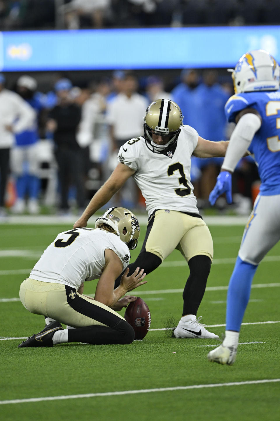 New Orleans Saints place kicker Wil Lutz (3) kicks a field goal in the second half of an NFL football game against the Los Angeles Chargers in Inglewood, Calif., Sunday, Aug. 20, 2023. (AP Photo/Alex Gallardo)