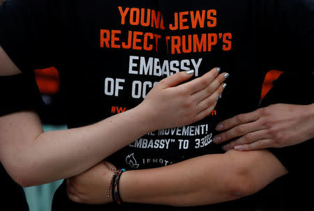 People organized by IfNotNow circle up after protesting against the new U.S. Embassy opening in Jerusalem in Washington, U.S., May 14, 2018. REUTERS/Leah Millis