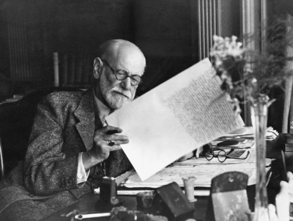 <div class="inline-image__caption"><p>Sigmund Freud looking through a manuscript in the office of his Vienna home.</p></div> <div class="inline-image__credit">Bettmann/Getty</div>