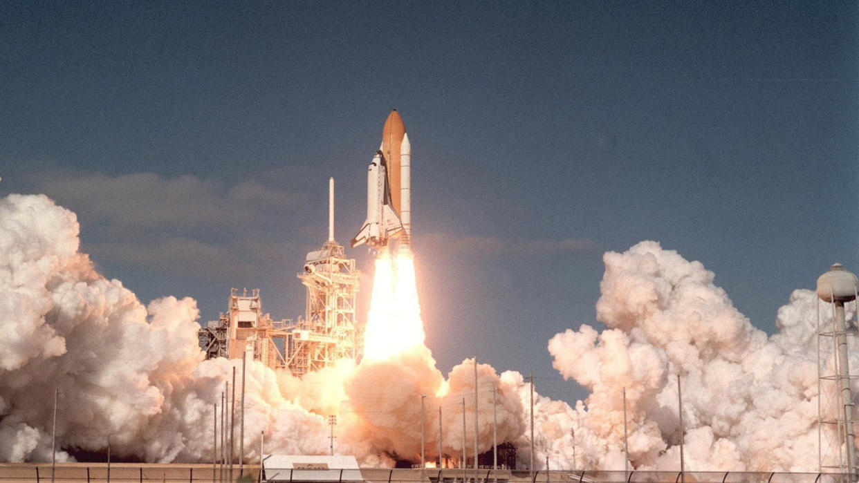  Space shuttle Columbia and its seven-member crew lifts off from Kennedy Space Center on 16 January 2003. 