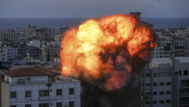 Fire and smoke rise following an Israeli airstrike, in Gaza City on Oct. 8, 2023. The militant Hamas rulers of the Gaza Strip carried out an unprecedented, multifront attack on Israel at daybreak Saturday.