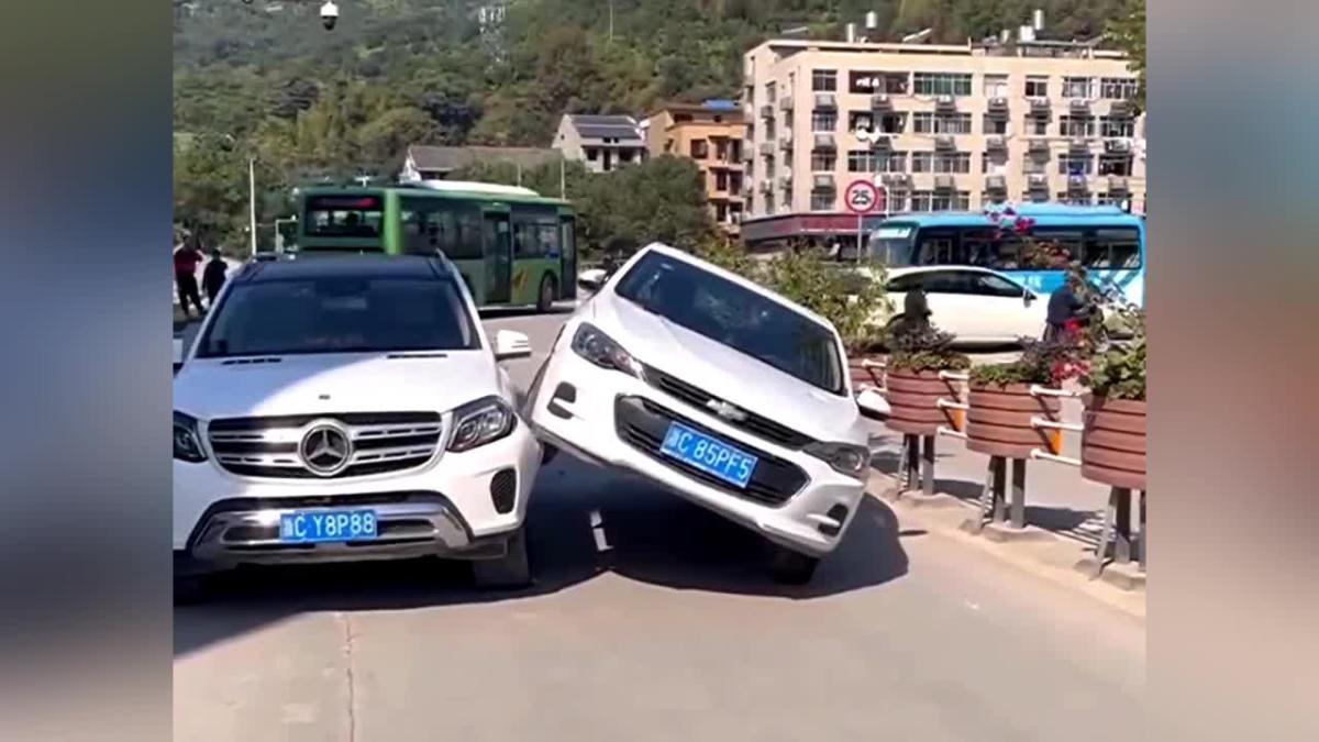 Chevrolet tipped into air after hitting another vehicle in