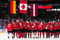 Canada celebrates after defeating Germany to win the Ice Hockey World Championship in Tampere, Finland, Sunday, May 28, 2023. Canada won 5-2. (AP Photo/Pavel Golovkin)