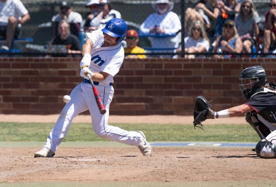 Modesto’s Dylan Fuller strikes a double during the 3C2A NorCal Regional playoff game with Sacramento City College at Modesto Junior College in Modesto, Calif., Friday, May 3, 2024. Andy Alfaro/aalfaro@modbee.com