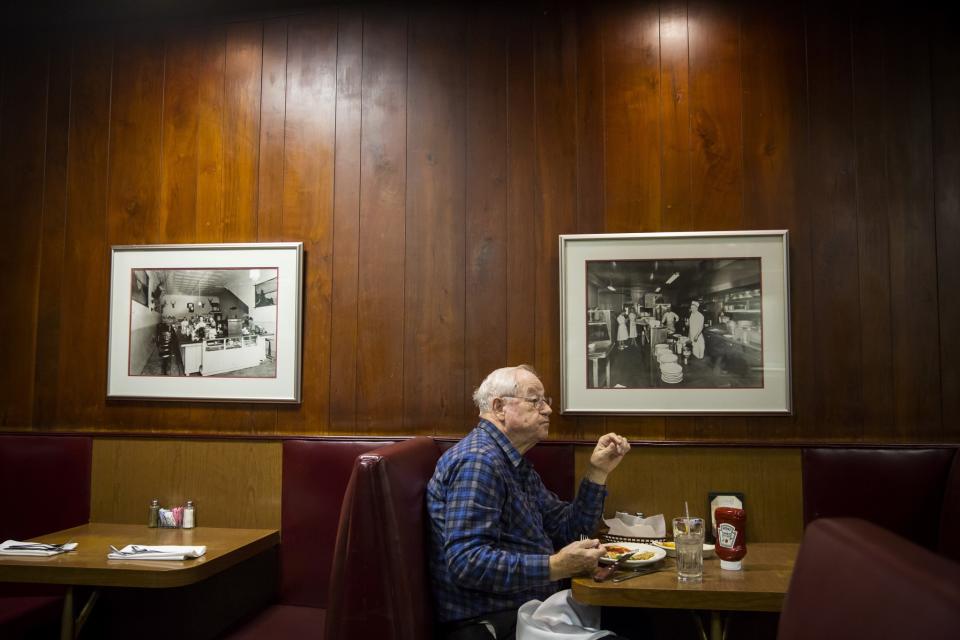 Bob Moore, a retiree who supported Donald Trump, eats at Cattlemen's Steakhouse Dec. 1 in Oklahoma City, Okla. (Photo: Eric Thayer for Yahoo News)